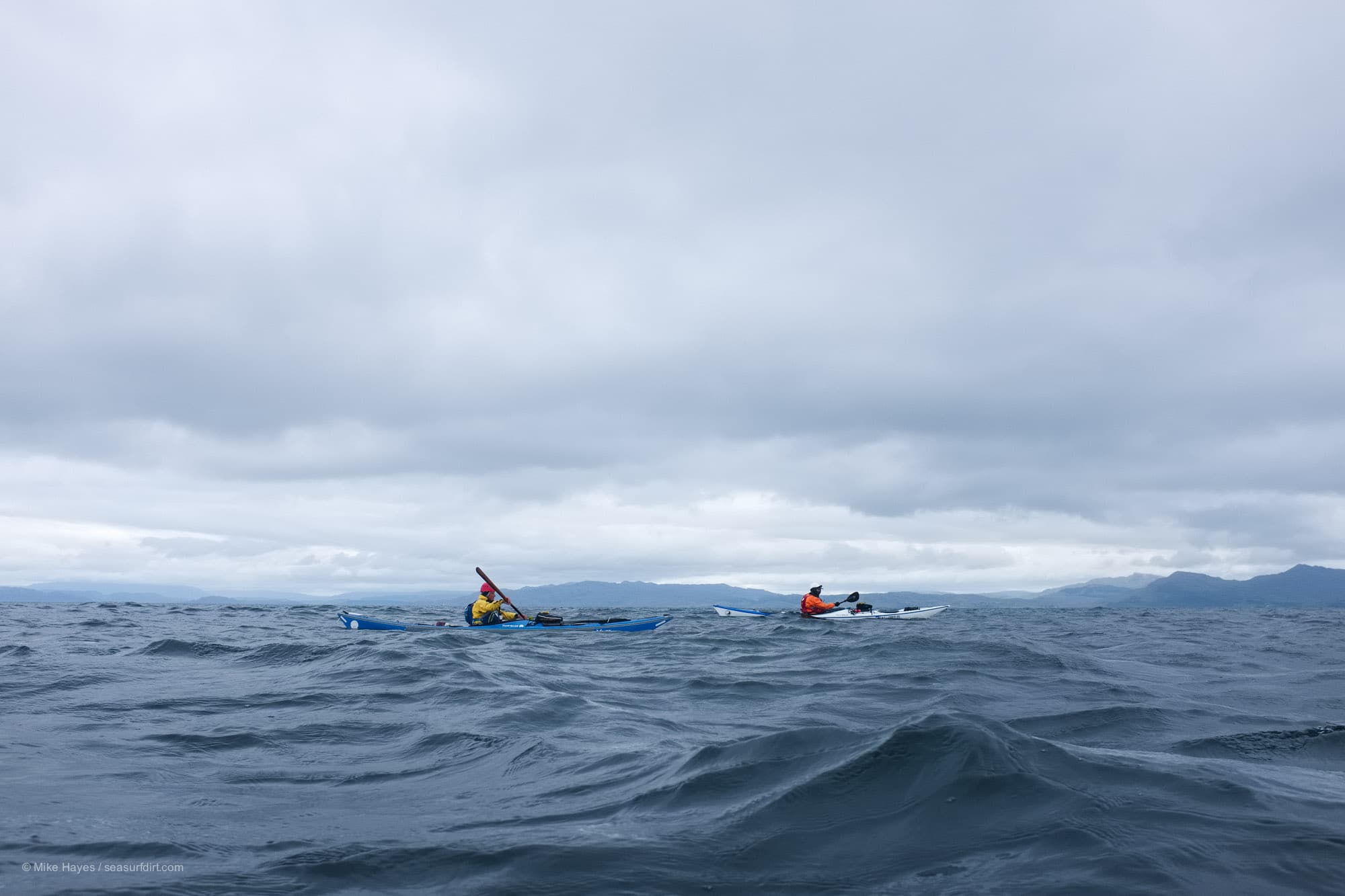 Sea kayaking across the Sound of Eigg to the Isle of Muck