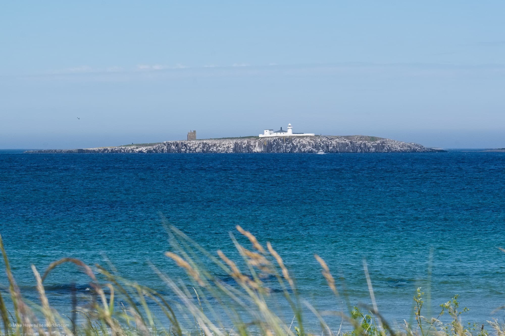 View of the Farne Islands from the beach near Bamburgh