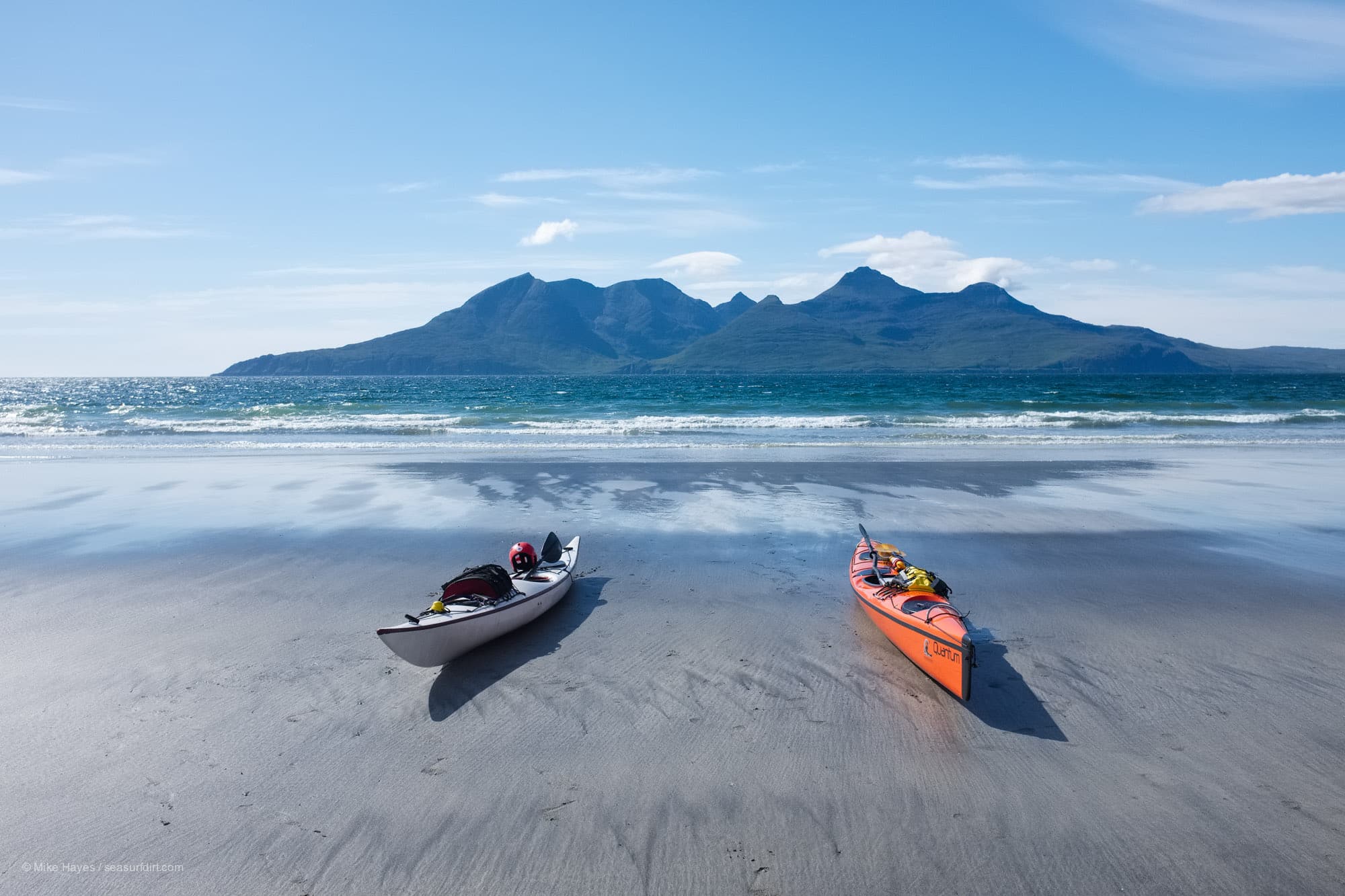 SKUK Quantum sea kayak at Traigh Chlithe, Isle of Eigg. Rum in the background.